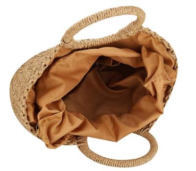 China Daily Life OEM Women Customized Straw Bag Rattan Round Beach Hand Straw Bag for sale