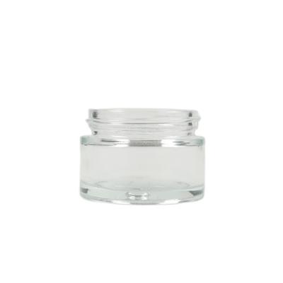 China Cosmetic Manufacturer Wholesale Transparent Molded Face Lotion Bottles Glass Jar 22ml for sale