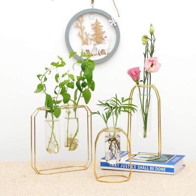 China High Quality CLASSIC Dining Room Table Flower Vase Ornaments Clear Glass Vase With Iron Frame for sale