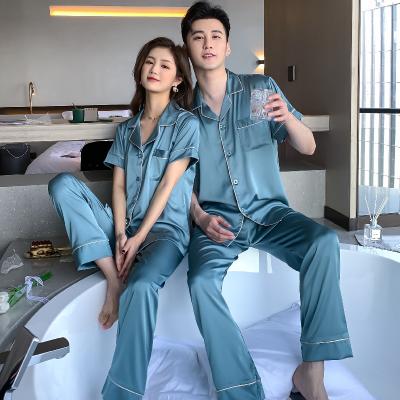 China Home Wear Cool And Comfortable Silk 2-Piece Pajamas Summer Solid Color Short Sleeve Pants Plus Size Couples Pajamas for sale