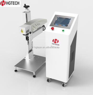 China Laser Marking HGTECH Online Flying High Speed ​​Fiber Metal Laser Engraving Machine for QR Code for sale