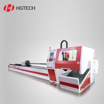 China Automatically Position HGTECH Laser 8mm Carbon Steel Tube Cutting Machine 8m Length 70mm OD Aluminum Fiber 1.5mm Thickness for sale