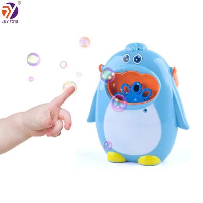 China Kids Toys Portable Automatic Penguin Shaped Bubble Toys Music Bubble Machine Newest For Children for sale