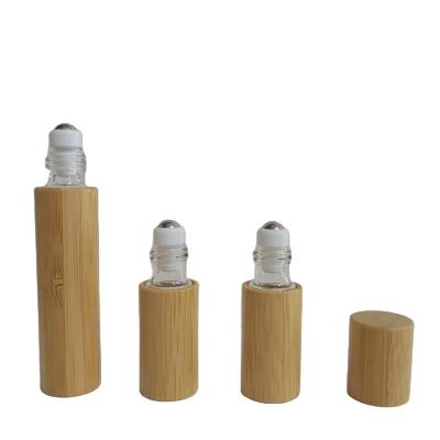 China 5ml 10ml 15ml Personal Custom Color Skin Care Roll-on Roll-on Essential Oil Packaging Container Steel Screw On Bamboo Roll On Bottle for sale