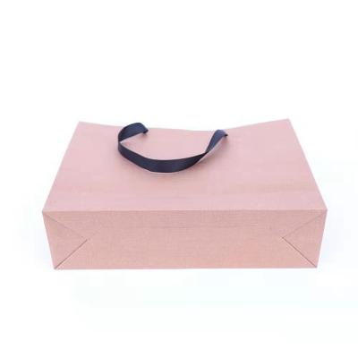 China Handmade Luxury Custom Gift Pink Netting Bag Fashion Packaging Paper Bags With Your Surprise for sale