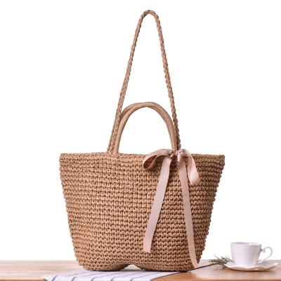 China 100% Eco-friendly Wholesale Bohemian Portable Double Use Bag Woven Bags Bowknot Shoulder Straw Bag Seaside Vacation Beach for sale