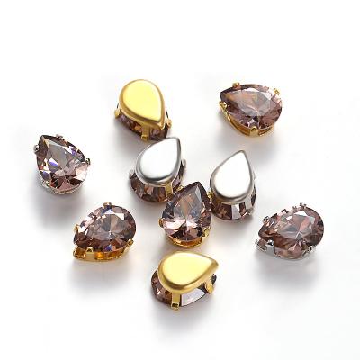 China Shinning Wholesale Best Price 6*8MM Oval Cut Colorful Sew On Zircon Stones Black Loose Glass Crystal Rhinestones In Metal Frame for sale