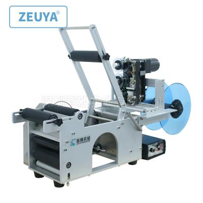 China Food tabletop electric manual labeling machine with coder for round bottles and beverage bottles sticker labeling coder LT-50D for sale