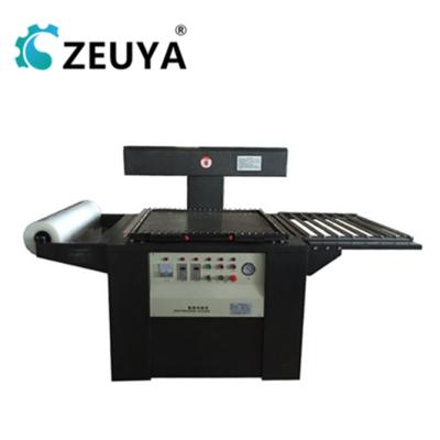 China ZEUYA CLOTHING Semi-automatic Skin Packing Machine For Material TB-700 390*700MM for sale