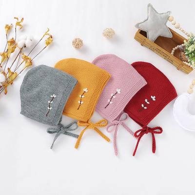 China Interesting Plum Embroidery Baby Hat Handmade Newborn Knitted Hat Cheap Wholesale COMMON Baby Hats for sale