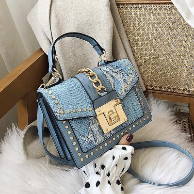 China Fashion 2021 summer new woman handbag small square bag lock shoulder bag rivet diagonal lady bag for sale