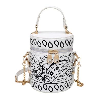 China Fashion 2021 summer new style women diagonal bucket bag cylinder one-shoulder portable printing ladies handbag for sale