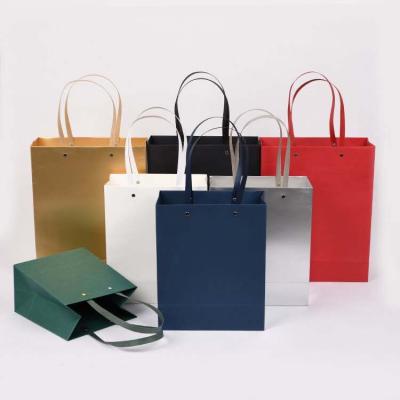 China Reused Materials Sell Logo Print Shopping Paper Bags Wholesale Custom Made With Your Own Logo For Clothes Shoes for sale