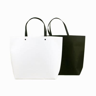 China Hot Sale Materials Manufacturers Recycled Custom White Retail Paper Packaging Luxury Shopping Bags For Clothes With Handle for sale