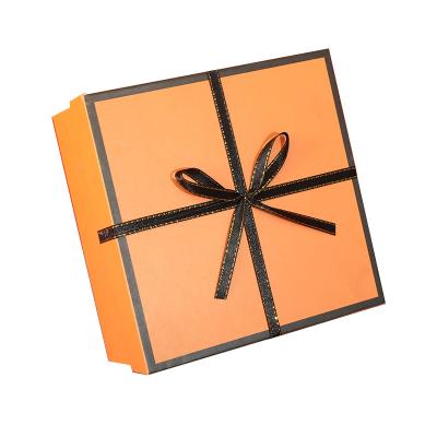 China Recycled Materials Manufacture Logo Ribbon Gift Paper Boxes Orange Custom Luxury Cardboard Wedding Gift Box for sale