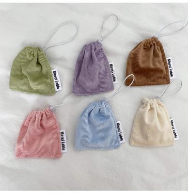 China Japan Style Corduroy Drawstring Custom Makeup Cosmetic Packaging Small Cosmetic Pouch Cute Logo Bag for sale