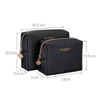 China Hot Selling Waterproof Stamping Black Ladies Make Up Purse Zipper Makeup Pouch PU Leather Cosmetic Bag for sale