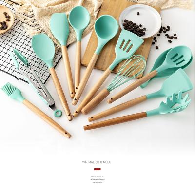 China Sustainable 11Pcs Silicone Kitchen Utensils With Wooden Handle Silicone Green Kitchen Utensils Cooking Sets for sale