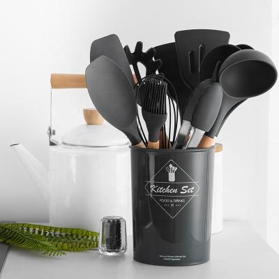 China Sustainable 11Pcs Silicone Kitchen Utensils With Wooden Handle Dark Gray Kitchen Utensils Silicone for sale