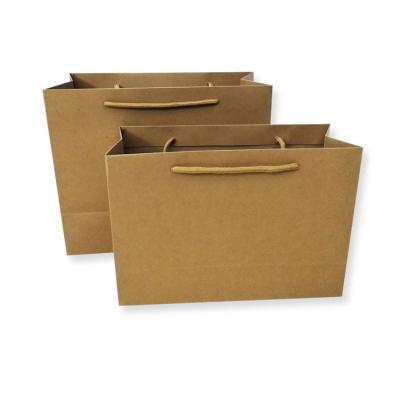 China Recycled Materials Custom logo packaging bags clothing shoes shopping paper bags kraft paper handbags for sale