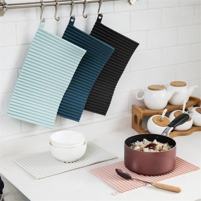 China 2021 Multifunctional Waterproof Table Mat Stored TPR Heat Insulation Table Mat Drain Board Solid Color Place Mats for sale