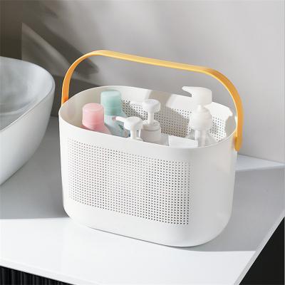 China 2021 Eco-friendly Plastic Stocked Bath Basket Bathroom Storage Basket With Handles For Bathroom And Kitchen for sale