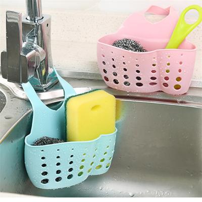 China 2021 Adjustable Buckle Type Kitchen Sustainable Supplies Hanging Drain Basket Kitchen Sink Storage Basket For Bathroom for sale