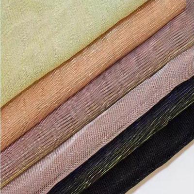 China Anti Pill Two Color Slide Metal Silk Metallic Color Soft Pleated Dress Fabric For Skirt Garment for sale