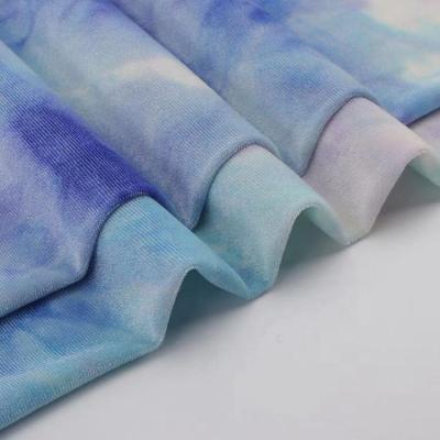 China Anti Pill Knitted Polyester And Spandex Bandhnu On Velvet Fabric Elastic Tie Dye Velvet For Women Clothes for sale