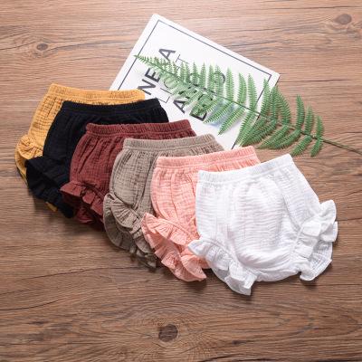 China Breathable Newborn Infant Harem Pants Solid Color Canvas Cotton Triangle Bloomers Kids Bread Pants Baby PP Shorts for sale