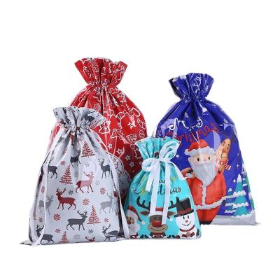 China New 2020 New Christmas Decorations Drawstring Gift Bag Christmas Candy Bags Christmas Gift Bags for sale