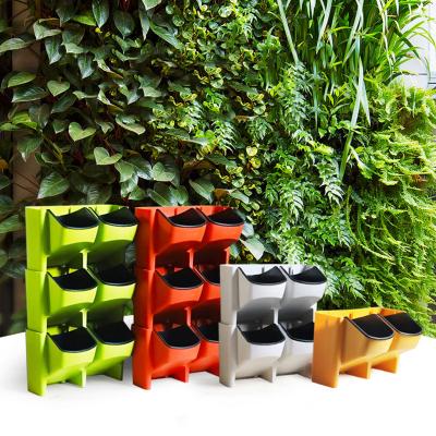 China 2020 Eco-friendly Creative Wall Mounted Plants Flower Pot Planters Wall Flower Pot Plastic Flower Pots for sale