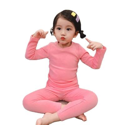 China Breathable Autumn Winter Solid Color Home Wear Boys Pajamas Children's Stretch Suit Girls Baby Long Johns for sale