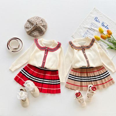 China 2023 Preppy Two-piece Set Autumn New Style Knitted Sweater Cardigan Skirt Girl's Windproof Girls' Set for sale