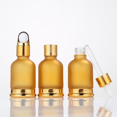 China High Quality Personal Care 30ml Gold Color Essential Oil Glass Bottle For Smoke Oil Dropper Glass Bottle for sale