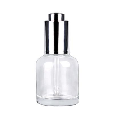 China Personal Care 30ML Essential Oil Glass Bottle Serum Packaging Glass Dropper Bottle With Button Pressing Dropper Pump for sale