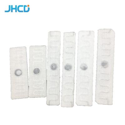 China Hotel Hospital Towel Waterproof Washable High Temperature Resistance Rfid UHF Fabric Laundry Tag For Laundry Industry for sale