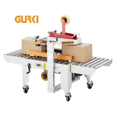 China Full Automatic Food Box Crate Sealer Machine Random Prices Random Cardboard Carton Sealing Machine for sale