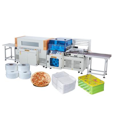 China Automatic Confectionery Wrapping Machines Automatic Confectionery Food Pizza Box Shrink Wrap Dvd Box Shrink Wrap Tunnel Cosmetic Machine for sale