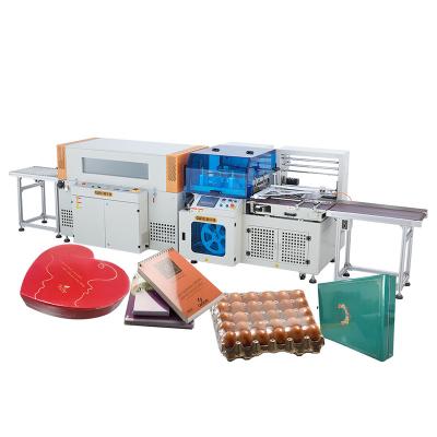 China Full Automatic Food Mobile Phone Box Shrink Packing Machine Shrink Paper Wrapping Machine For Cosmetics Perfume Carton Box for sale