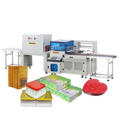 China Automatic Food Dvd Book Shrink Wrapping Machine Paper Food Black Pepper Document Cloth Bath Bomb Shrink Wrap Machine for sale