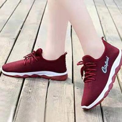 China New all-match women's casual shoes cushioning flying letters woven ultra-light non-slip sports shoes for sale