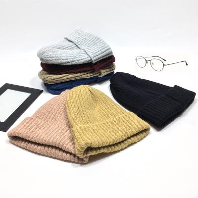 China JOINT Wholesale Custom Mens Winter Beanies Knitted Hat With Leather Patch Label for sale