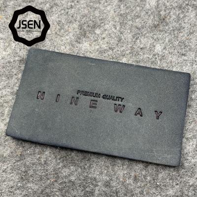 China High Quality Viable Lattice Leather Label With Debossed Logo Pattern Genuine Leather Label For Clothing for sale