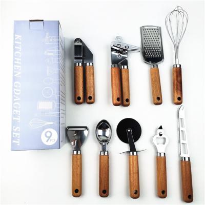 China New Amazon Sustainable 9 Pcs Smart Home Kitchen Stainless Steel Kitchen Tools and Sustainable Instruments Accessories Set 2020 with Wood Handle for sale