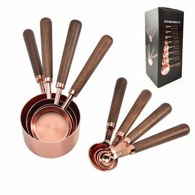 China 8 Pcs Viable Amazon Kitchen Gadgets Baking Cooking Rose Gold Wooden Handle Stainless Steel-Copper Measuring Cups And Spoons Set for sale