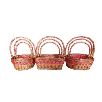 China Eco-friendly material cheap traditional colorful handmade willow basket with handle for christmas or holiday for sale for sale