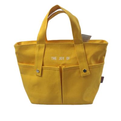 China Eco-friendly Pouch Cotton Shopping Bags Canvas Tote Bag With Outside Pockets for sale