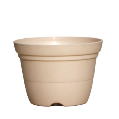 China New durable pp resin flower pot round flower pot with holes at the bottom of the good air permeability flower pot utensil holder for sale