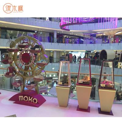 China Fashion Free Standing Fully Assembled Revolving Shoe Display Stand Custom Design Shoe Display Cases for sale